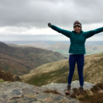 a student on top of mountain in Britain