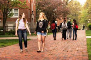 Students on brick sidewalk