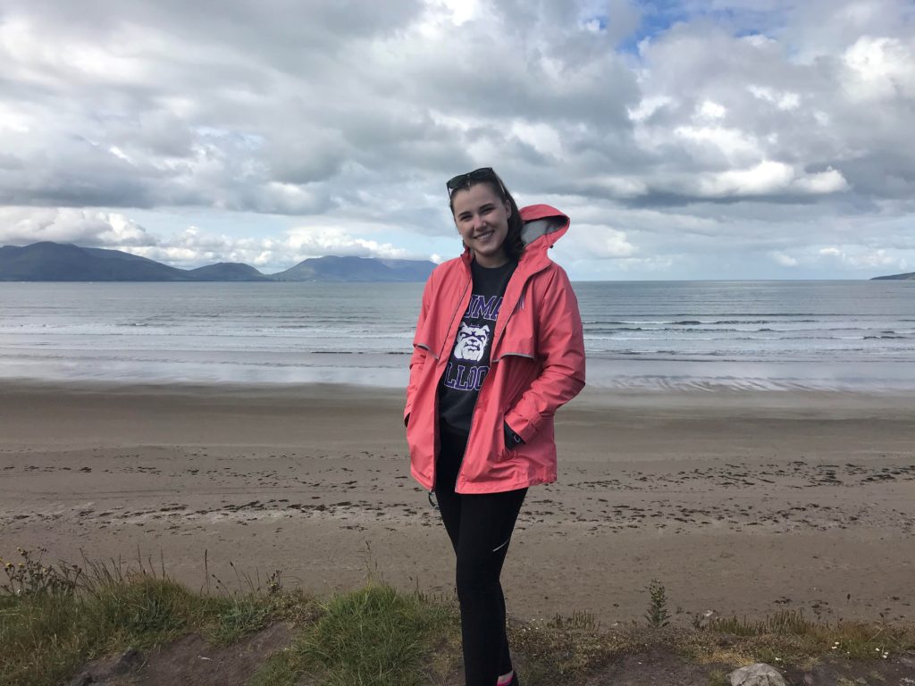 student at beach in scotland